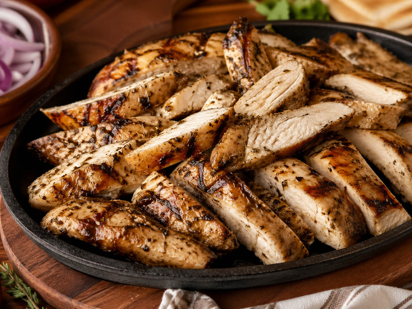 Grilled chicken sliced for healthy chicken gyros and high protein chicken gyros