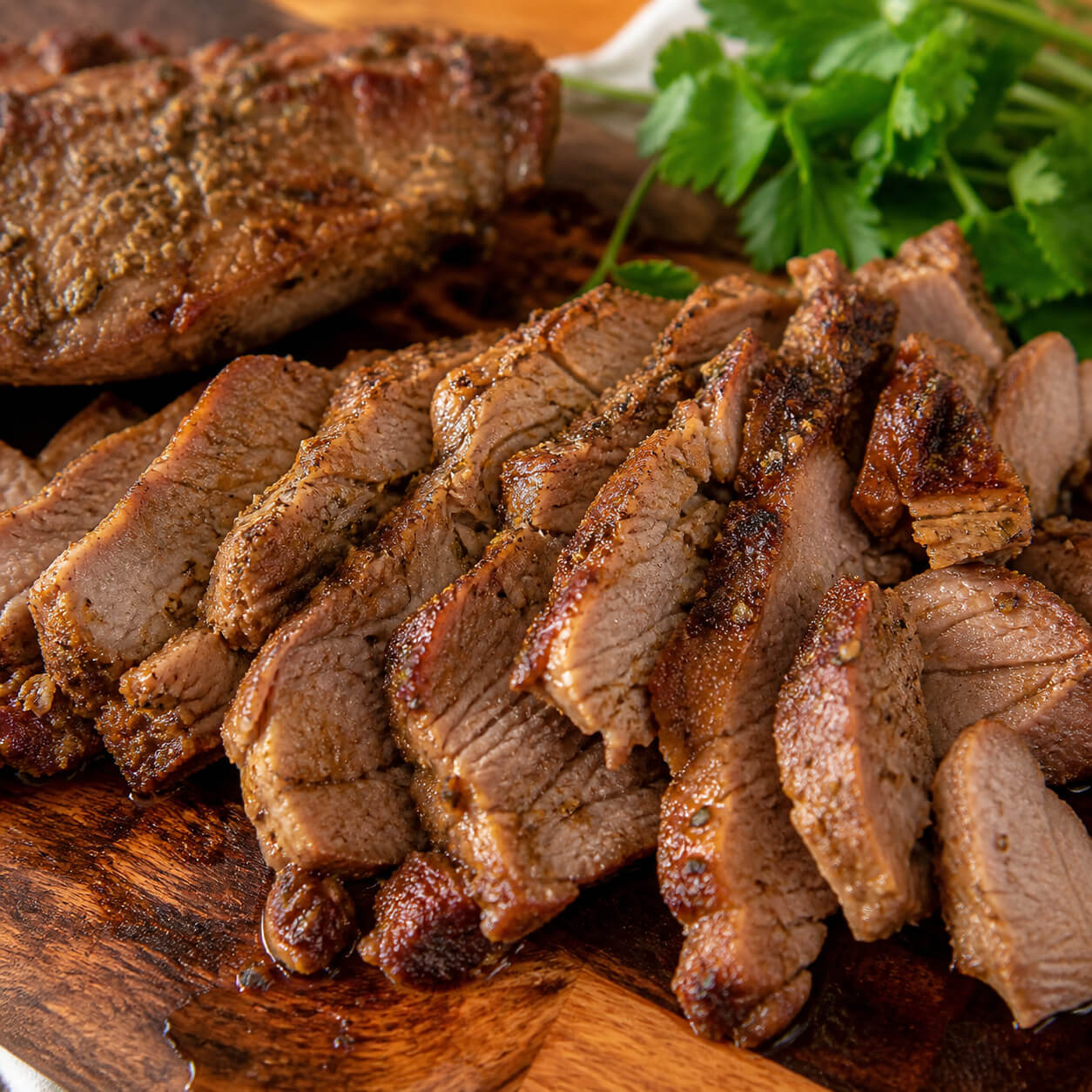 Keto gyro meat cooked until golden and sliced for a low carb gyro bowl