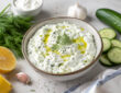 Tzatziki sauce recipe with Greek yogurt, cucumber, garlic, lemon, dill, and olive oil