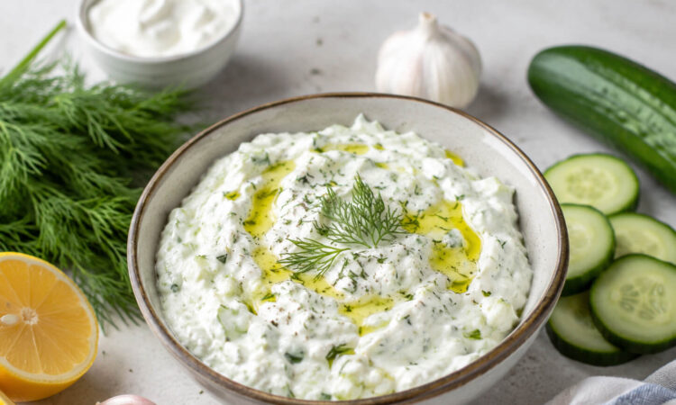 Tzatziki sauce recipe with Greek yogurt, cucumber, garlic, lemon, dill, and olive oil